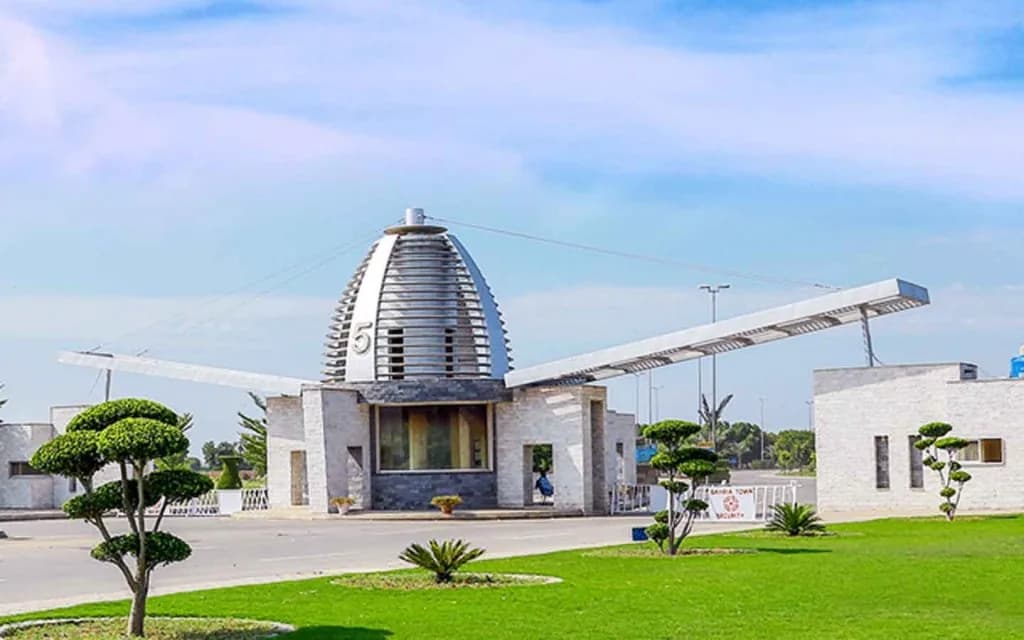 Bahria Orchard landmark domed building and gardens